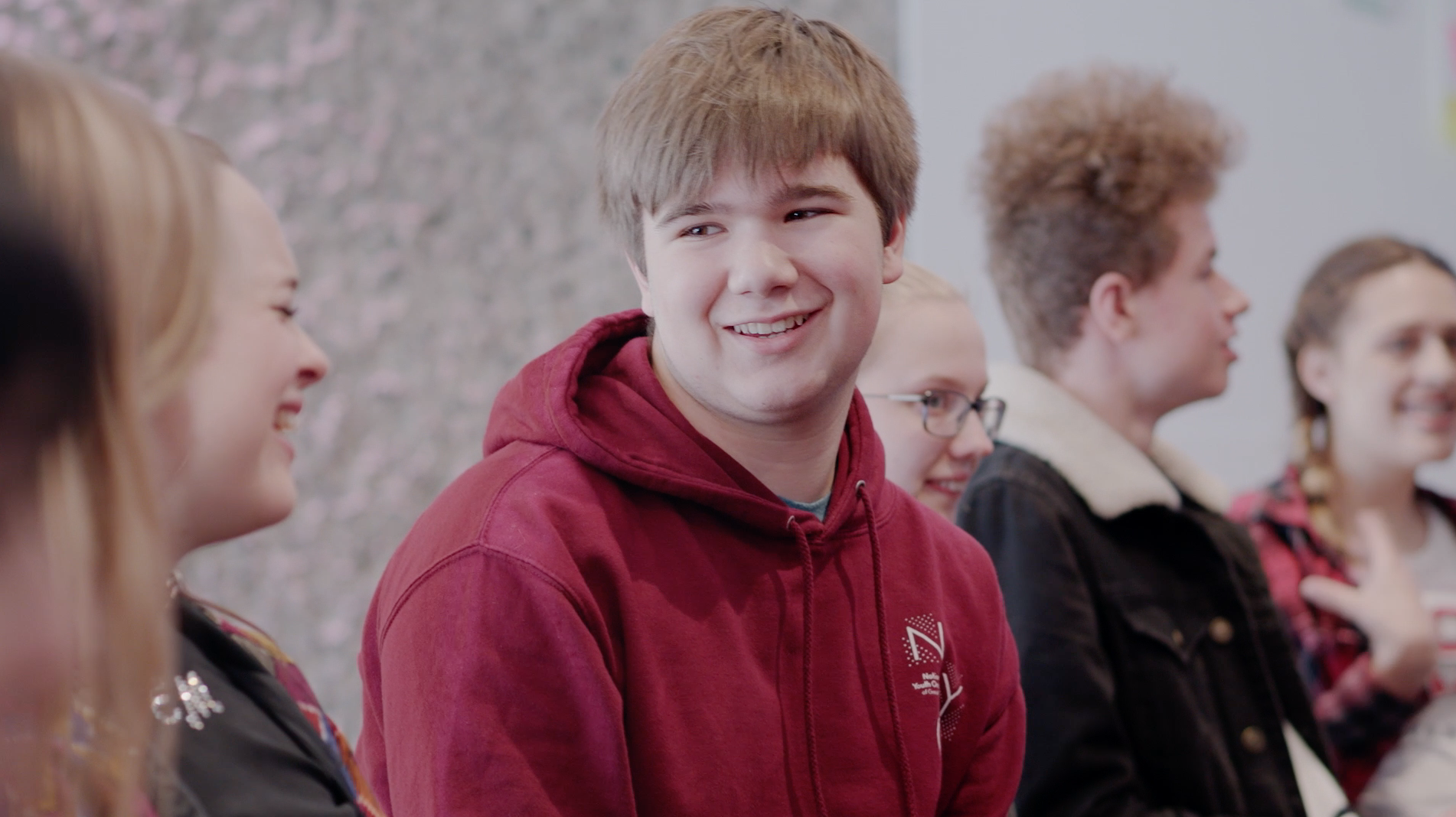 Young people talking at creative careers event.